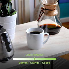 Tiny Footprint Coffee Signature Blend Light Roast bag open invites you to sample its fresh aroma