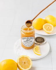 Close-up of Tiptree Lemon Curd's smooth, velvety texture for cake fillings.