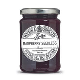 Tiptree Raspberry Seedless Preserve jar with smooth texture, ideal for toast or pastries.