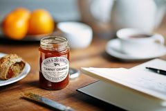 Tiptree Tawny Marmalade close-up showing thick-cut Seville orange pieces.