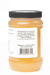 TJO Bees honey jar back label close-up highlighting natural, unfiltered quality.