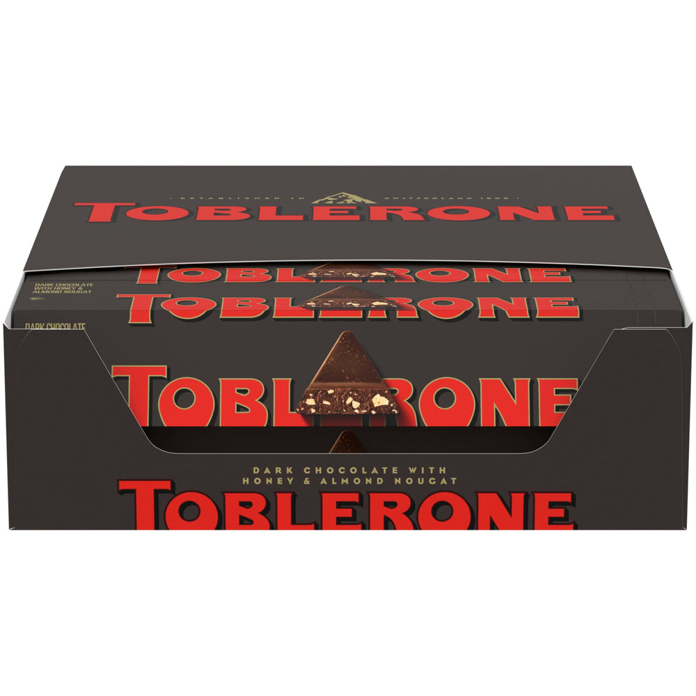 Toblerone dark chocolate bars with honey and almond nougat packaging, ideal for gifting.