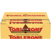 Toblerone milk chocolate bars with honey and almond nougat in packaging ideal for gifting.