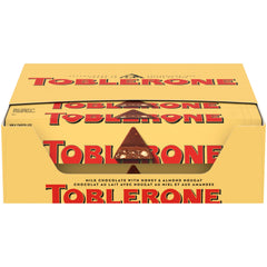 Toblerone milk chocolate bars with honey and almond nougat in packaging ideal for gifting.