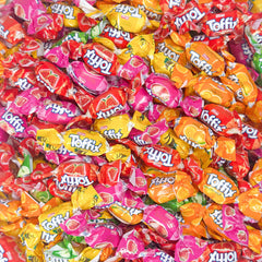 TOFFIX Fruit Chews pineapple center-filled bite for tropical refreshment.