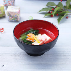 Tomosan Yuzu Dashi packet opened and used directly to boost flavor in stir-fries.