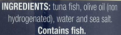 Tonnino tuna with olive oil close-up label showcases quality ingredients.
