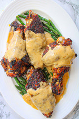 Close-up of Tony Chachere's Creole Seasoning granules and spice mix