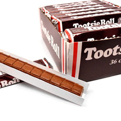 Tootsie Roll Bars neatly stacked, a crowd-pleasing display at events.