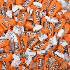 Tootsie Roll Mango Frooties close-up of chewy mango candies in wrappers.