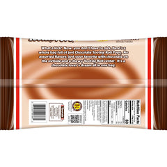 Close-up of chocolate shell and chewy center of Tootsie Pops