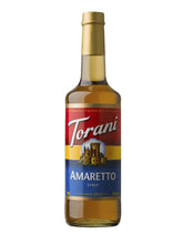 Torani Amaretto Syrup bottle close-up showing premium almond flavor.