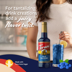 Pouring Torani Blue Raspberry into a glass to color a drink