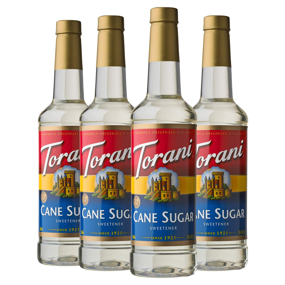 Torani cane sugar syrup bottle pouring for rich coffee and tea flavor