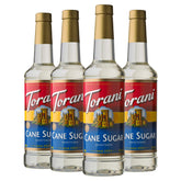 Torani cane sugar syrup bottle pouring for rich coffee and tea flavor