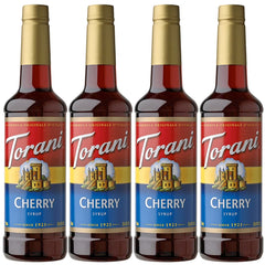 Torani Cherry Syrup bottle front view on a table, elevating everyday beverages with cherry flavor.