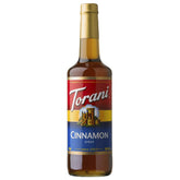 Torani Cinnamon Syrup bottle on display boosts coffee and dessert flavor variety.