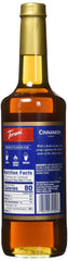 Torani Cinnamon Syrup closeup color highlights warm, inviting caramel hue.
