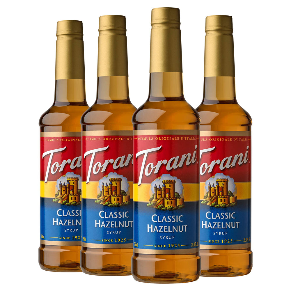 Torani Classic Hazelnut syrup bottle pour for flavorful beverages