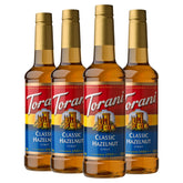 Torani Classic Hazelnut syrup bottle pour for flavorful beverages