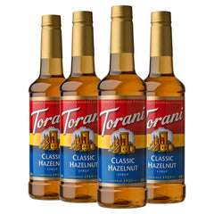 Torani Classic Hazelnut syrup bottle pour for flavorful beverages