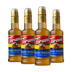 Torani Classic Hazelnut syrup bottle adds rich flavor to hot and cold drinks.