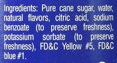 Torani Creme De Menthe syrup bottle angled for layered beverages and fizz.