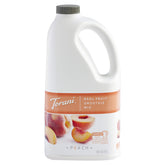 Torani Peach Real Fruit Smoothie Mix bottle pour showing easy blend readiness