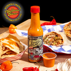 Torchbearer Zombie Apocalypse hot sauce dish close-up emphasizes ghost pepper heat and tang