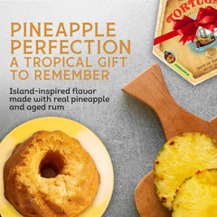 Tortuga pineapple rum cake slice reveals moist interior and glaze.
