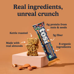 Tosi Nut Bars kid enjoying bar; wholesome snack for growing bodies.
