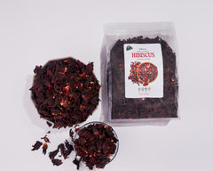 Sun-dried hibiscus petals by TradeBuza preserving color and flavor.