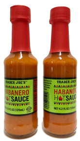 Trader Joe's Habanero Hot Sauce two-pack bottles pour demonstration; adds bold heat.