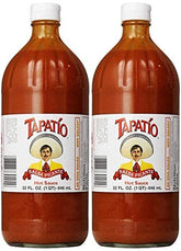 Trader Joe's Tapatio hot sauce two bottles on counter for quick flavor boosts.