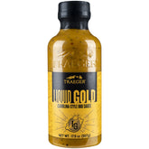 Traeger Liquid Gold BBQ Sauce bottle ready for versatile grilling.