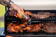 Glazed ribs with Traeger Que BBQ Sauce for a rich finish.