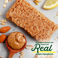 Organic oats and almond butter visible in Kate's Real Food bar for balanced energy on the go