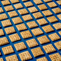 Triscuit Minis vegan Non-GMO badge visible on the pack.
