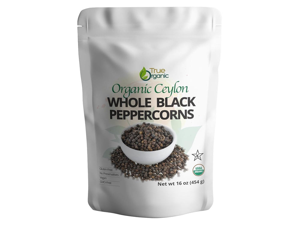 True Organic black peppercorns whole in a bulk bottle for grinder refills