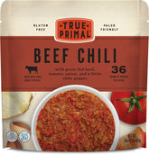 True Primal beef chili 8-pack on shelf, convenient ready-to-heat option.