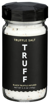 TRUFF Salt Truffle bottle on a kitchen counter highlights premium ingredients for gourmet meals