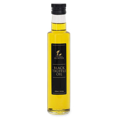 TruffleHunter black truffle oil bottle with glossy finish, ready to elevate home cooking aroma.