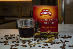 Trung Nguyen Gourmet Blend steaming cup—inviting aroma for a full-bodied brew.