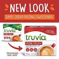 Truvia monkfruit packets beside a teacup for sugar-free tea