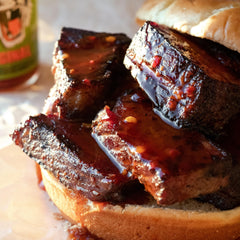 Try Me Tiger Sauce bottle pour capturing glossy heat for meats and seafood