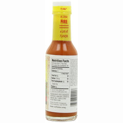 Try Me Yucatan Sunshine habanero sauce pour showing its versatile table condiment use.
