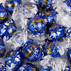 Tundras LindtTruffles close-up center, silky interior and cocoa shell.