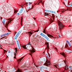 Tundras KISSES pink-wrapped chocolate in a candy bowl attracts guests