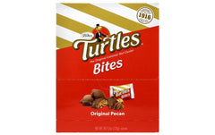 Turtles Double Chocolate Bite, cross-section showing chocolate caramel and pecans.