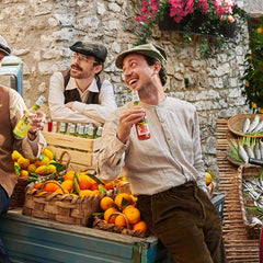 Tuscanini lemon soda label highlighting organic ingredients and quality.